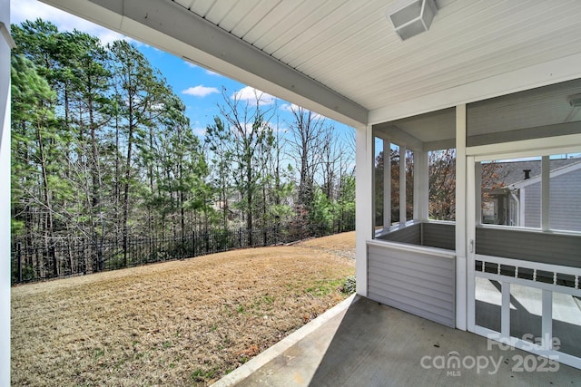 view of patio / terrace featuring fence