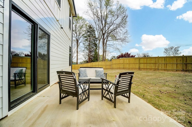 view of patio / terrace featuring a fenced backyard and an outdoor living space