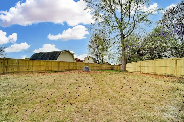 view of yard featuring a fenced backyard