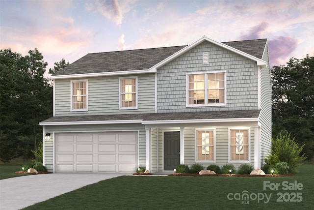 view of front facade featuring driveway, a garage, and a yard