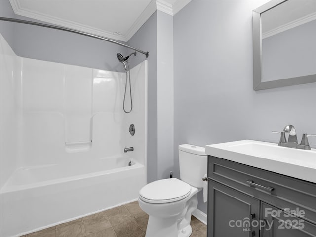 full bathroom featuring toilet, tile patterned flooring, crown molding, vanity, and shower / bathing tub combination