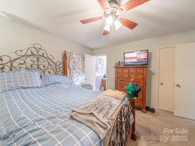 bedroom with light carpet and ceiling fan