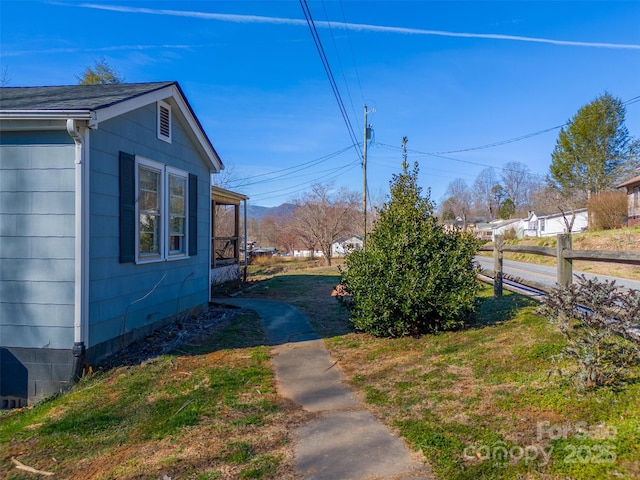 view of yard with fence