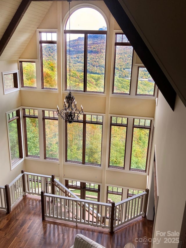 interior details with an inviting chandelier and wood finished floors