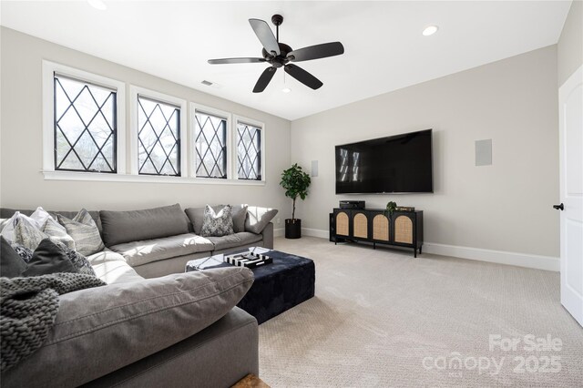 carpeted living room featuring visible vents, recessed lighting, baseboards, and ceiling fan