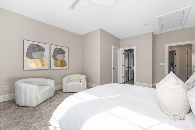 bedroom featuring attic access, baseboards, carpet floors, and ceiling fan