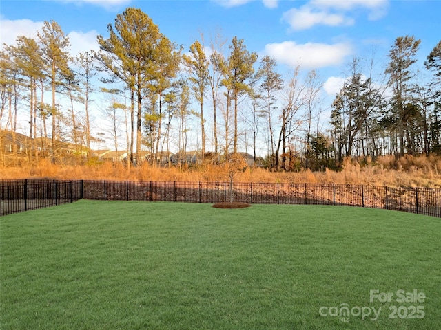 view of yard with fence