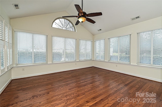 unfurnished sunroom with ceiling fan, lofted ceiling, and visible vents