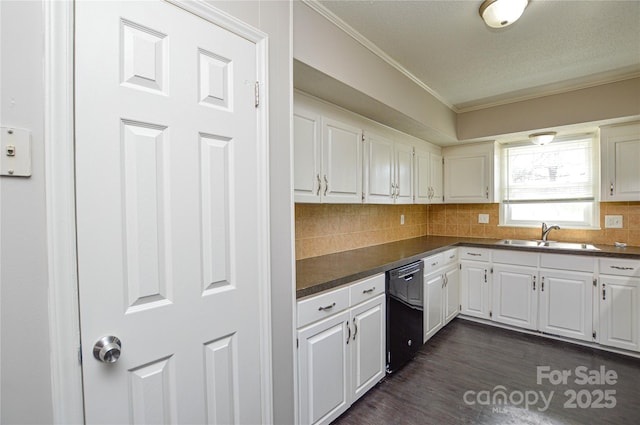 kitchen featuring a sink, ornamental molding, decorative backsplash, dishwasher, and dark countertops