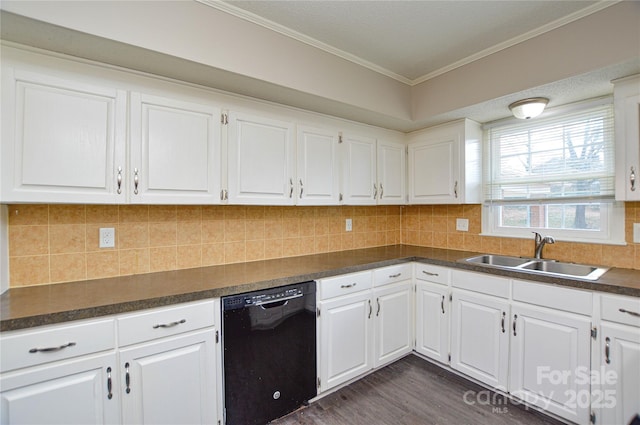 kitchen featuring ornamental molding, dark countertops, dishwasher, and a sink