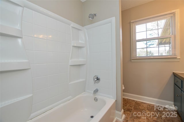 full bath featuring bathing tub / shower combination, a textured ceiling, vanity, baseboards, and tile patterned floors