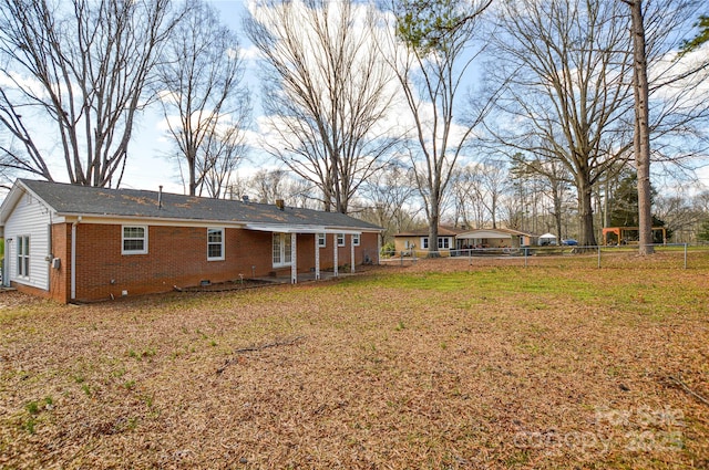 view of yard featuring fence