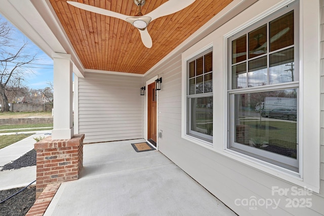 view of patio featuring a porch and a ceiling fan