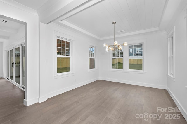 unfurnished dining area featuring visible vents, baseboards, ornamental molding, dark wood-style flooring, and a notable chandelier