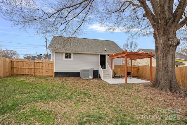 back of property featuring a yard, a pergola, central AC, entry steps, and a patio area