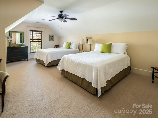 bedroom featuring lofted ceiling, carpet floors, a ceiling fan, and baseboards