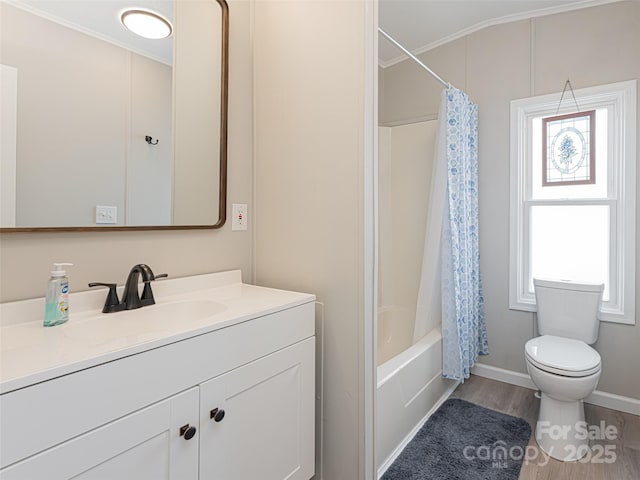 bathroom featuring vanity, shower / bathtub combination with curtain, wood finished floors, baseboards, and toilet