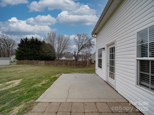 view of patio featuring fence