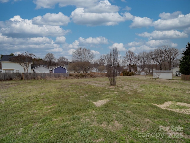 view of yard featuring fence