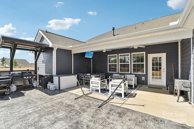 view of patio featuring an outdoor living space and a ceiling fan