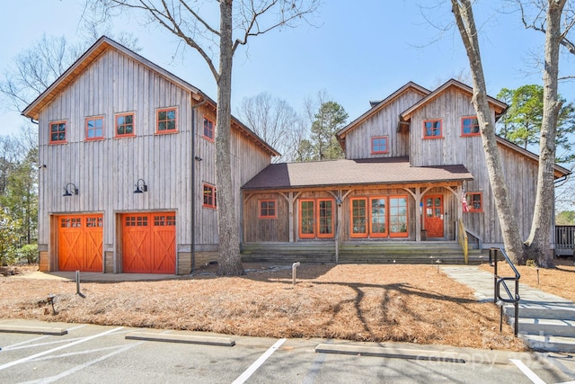 view of front of property featuring a garage and board and batten siding