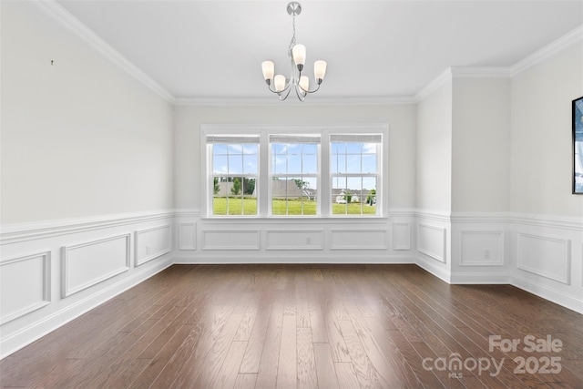 1300 Dali Blvd, Mount Holly, NC 28120 - spare room featuring a chandelier, wainscoting, dark wood-style flooring, and crown molding