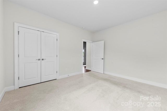1300 Dali Blvd, Mount Holly, NC 28120 - unfurnished bedroom with carpet floors, baseboards, and a closet