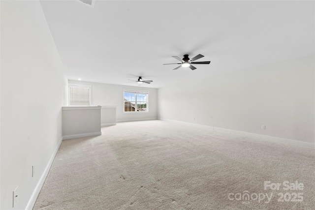 1300 Dali Blvd, Mount Holly, NC 28120 - unfurnished living room featuring ceiling fan, carpet floors, and baseboards