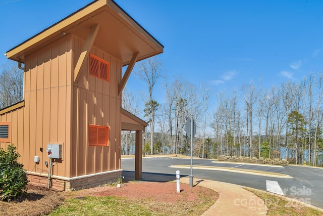 1300 Dali Blvd, Mount Holly, NC 28120 - view of side of home with board and batten siding