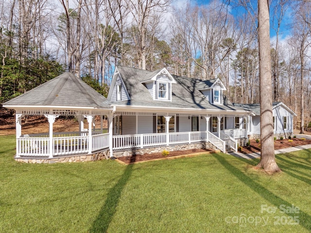 view of front facade featuring a porch, a front lawn, and a gazebo