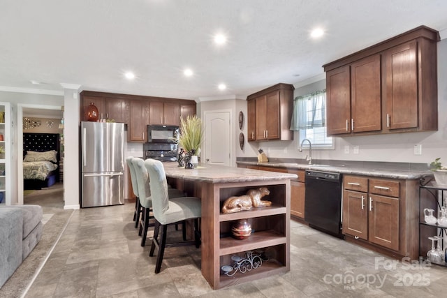 kitchen with a kitchen island, ornamental molding, a breakfast bar, black appliances, and open shelves