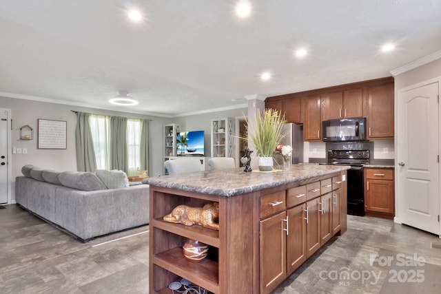 kitchen featuring open shelves, open floor plan, a center island, black appliances, and crown molding