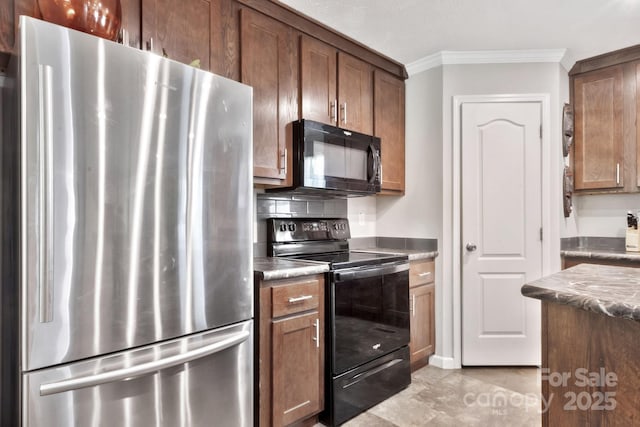 kitchen with ornamental molding and black appliances