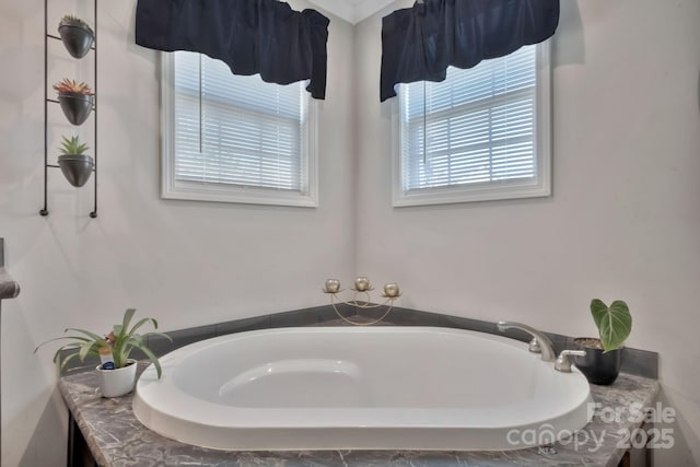 bathroom featuring a garden tub