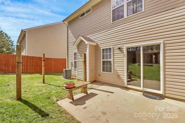 view of patio with fence and cooling unit