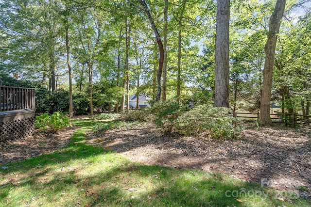 view of yard with a wooden deck