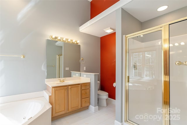 full bathroom featuring tile patterned flooring, toilet, a stall shower, a bath, and vanity