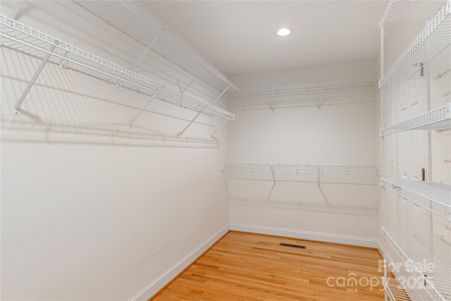 walk in closet featuring light wood-type flooring