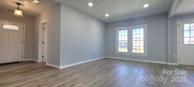 entrance foyer featuring recessed lighting, baseboards, and wood finished floors