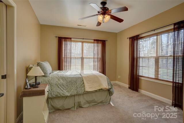 15100 Durmast Ct, Mint Hill, NC 28227 - bedroom with visible vents, baseboards, multiple windows, and light colored carpet