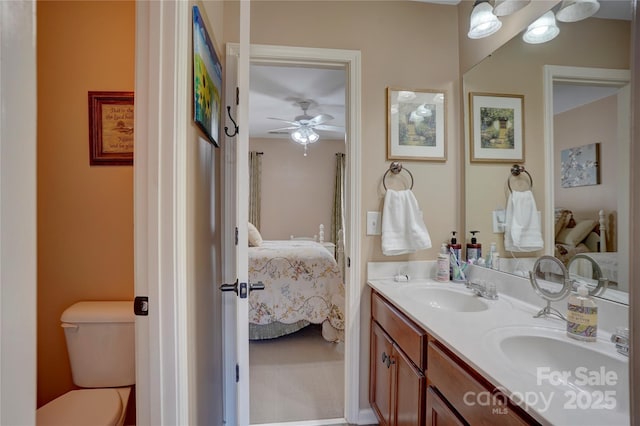 15100 Durmast Ct, Mint Hill, NC 28227 - bathroom featuring double vanity, ensuite bath, a ceiling fan, toilet, and a sink