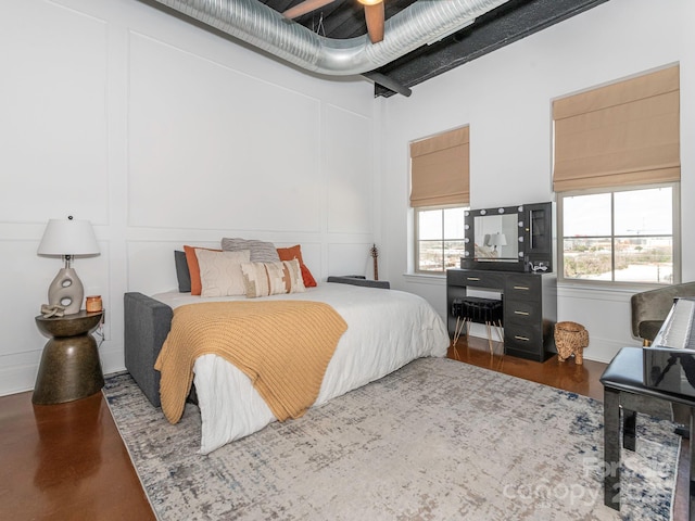 bedroom with a decorative wall