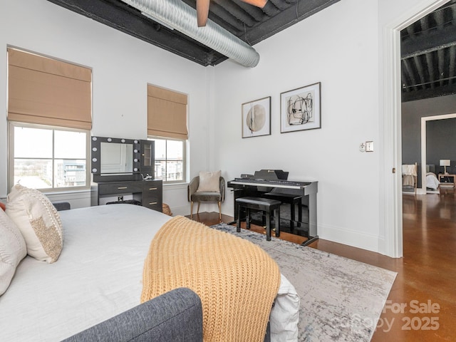 bedroom featuring baseboards