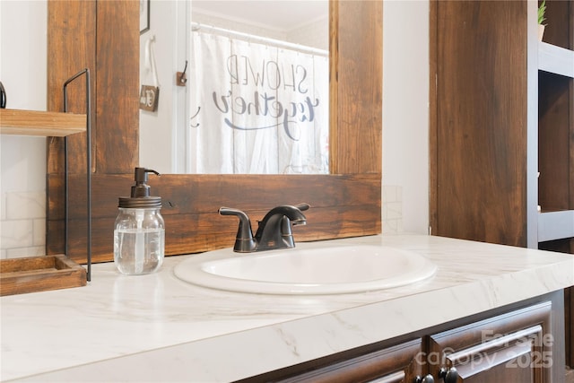 full bathroom featuring vanity and a shower with curtain