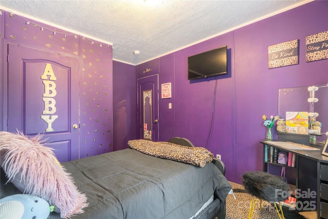 bedroom featuring a textured ceiling