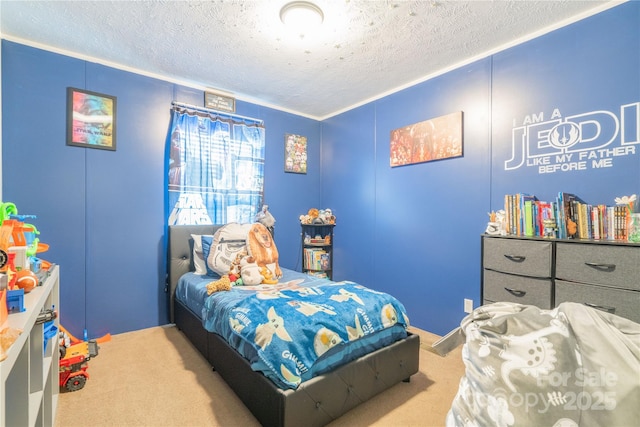 bedroom featuring a textured ceiling and carpet floors