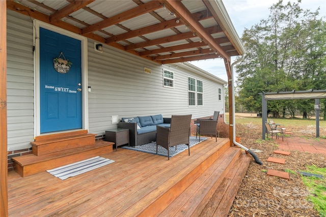 deck featuring entry steps and an outdoor living space