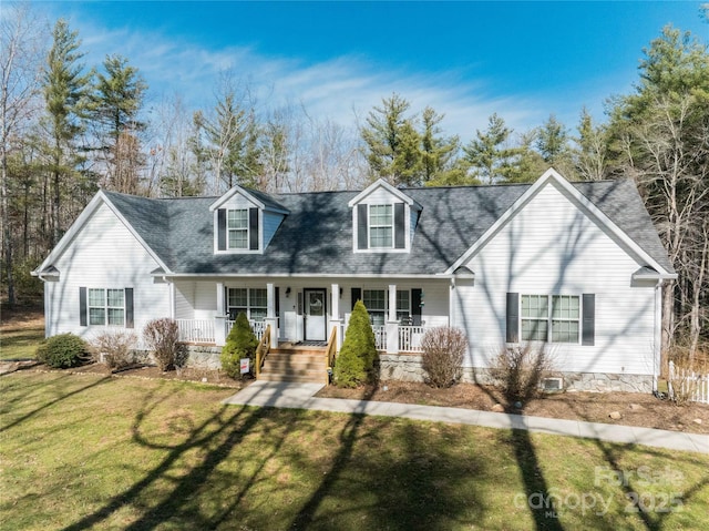 cape cod-style house with a front lawn and a porch