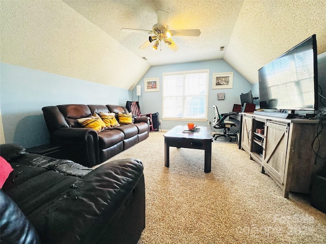 carpeted living area featuring vaulted ceiling, a textured ceiling, and ceiling fan