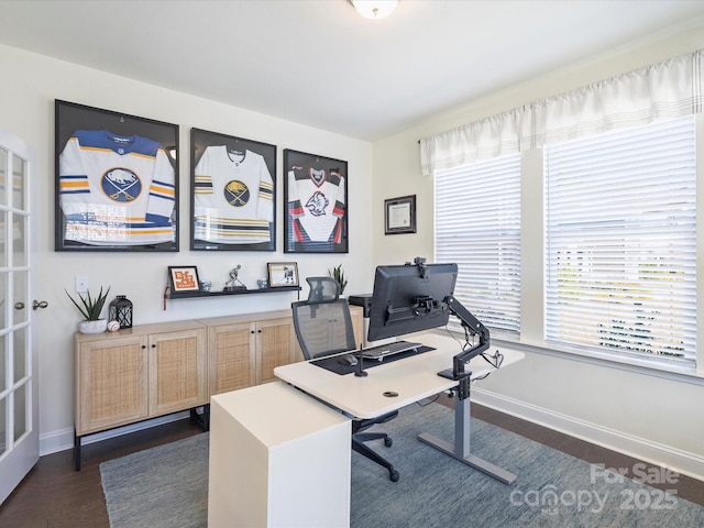 office featuring baseboards and dark wood-style flooring